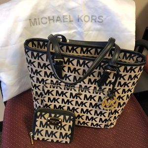MK black & tan purse, never used. Comes with wallet.